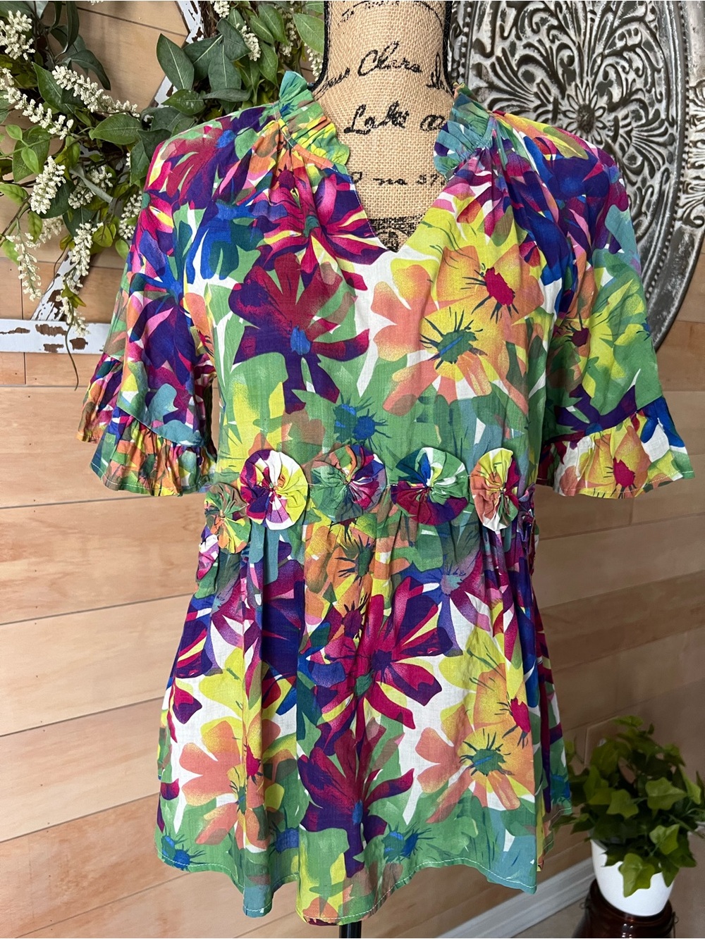 Gigi’s Vibrant Floral Short-Sleeve Women's Top - Multicolor